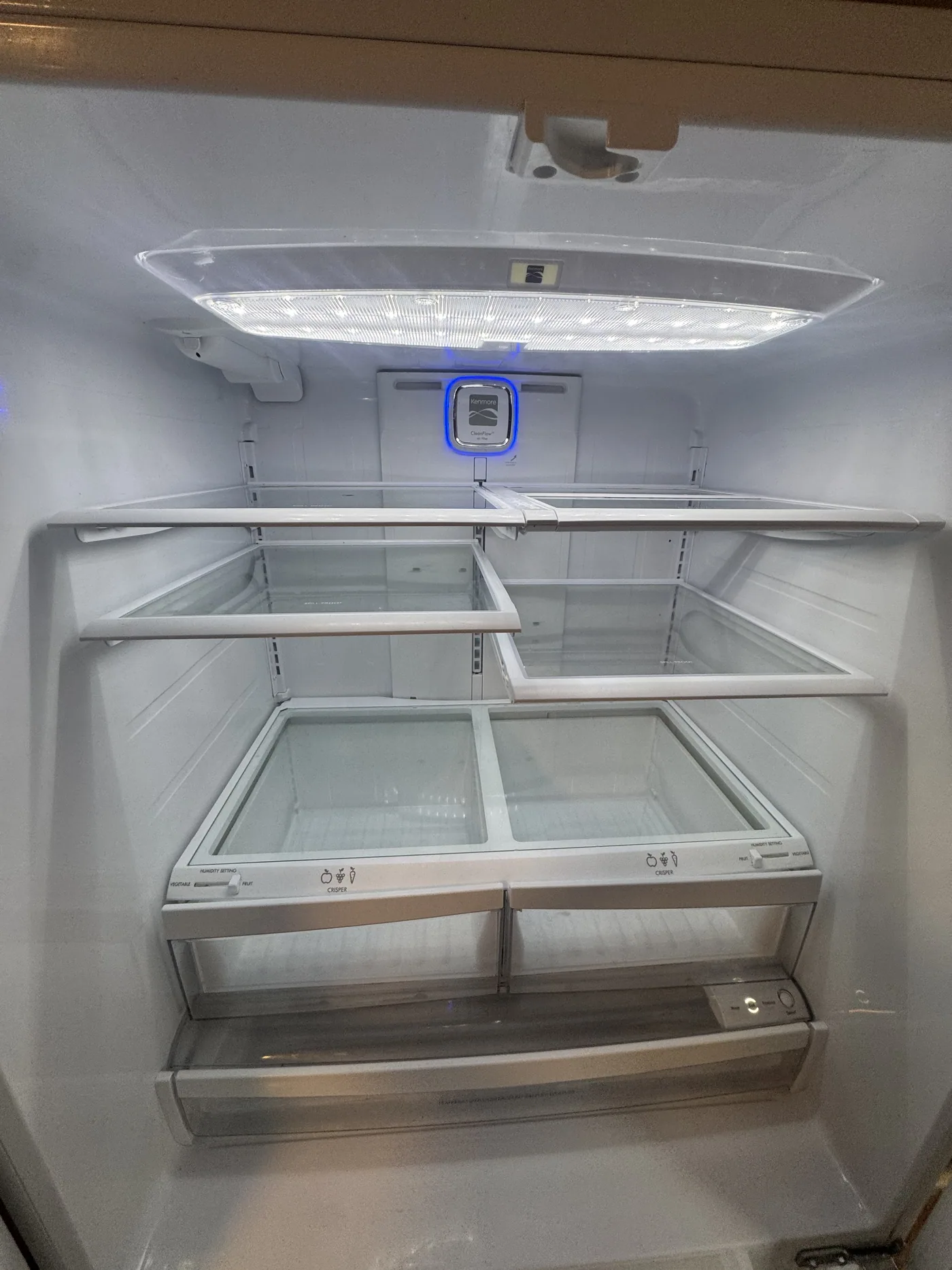 After: refrigerator interior fully degreased, sanitized and streak-free