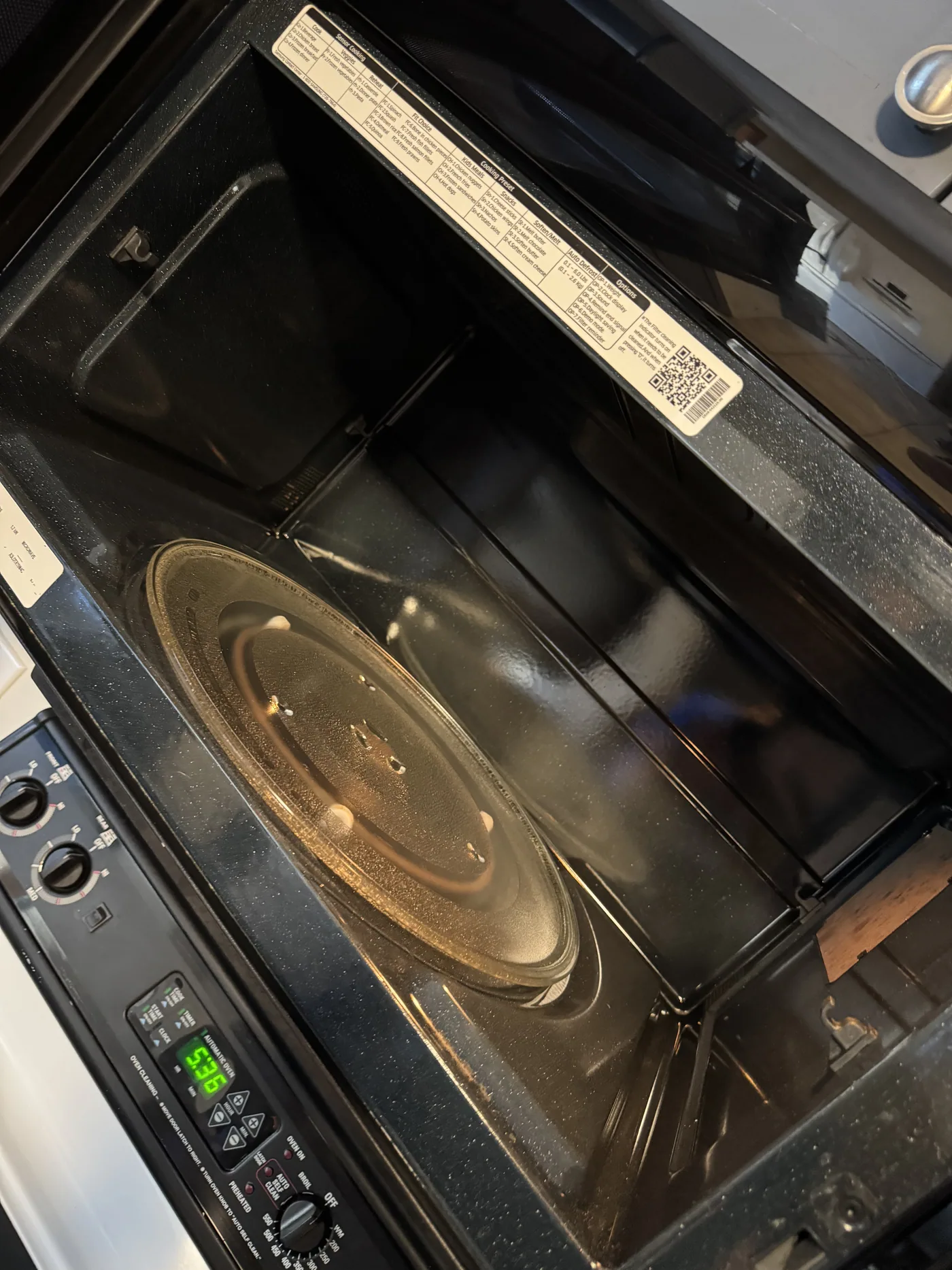 After: microwave interior and turntable degreased back to a clean finish